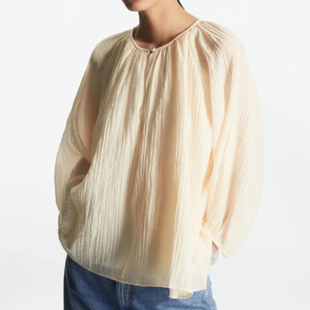 COS cream seer sucker puff sleeve top size 10 pleated sheer lined gauze keyhole